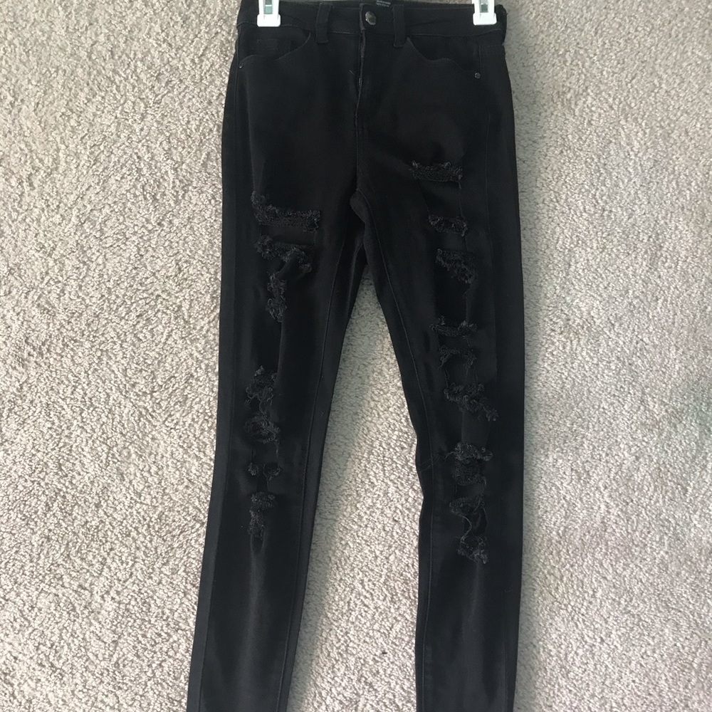 black ripped jeans